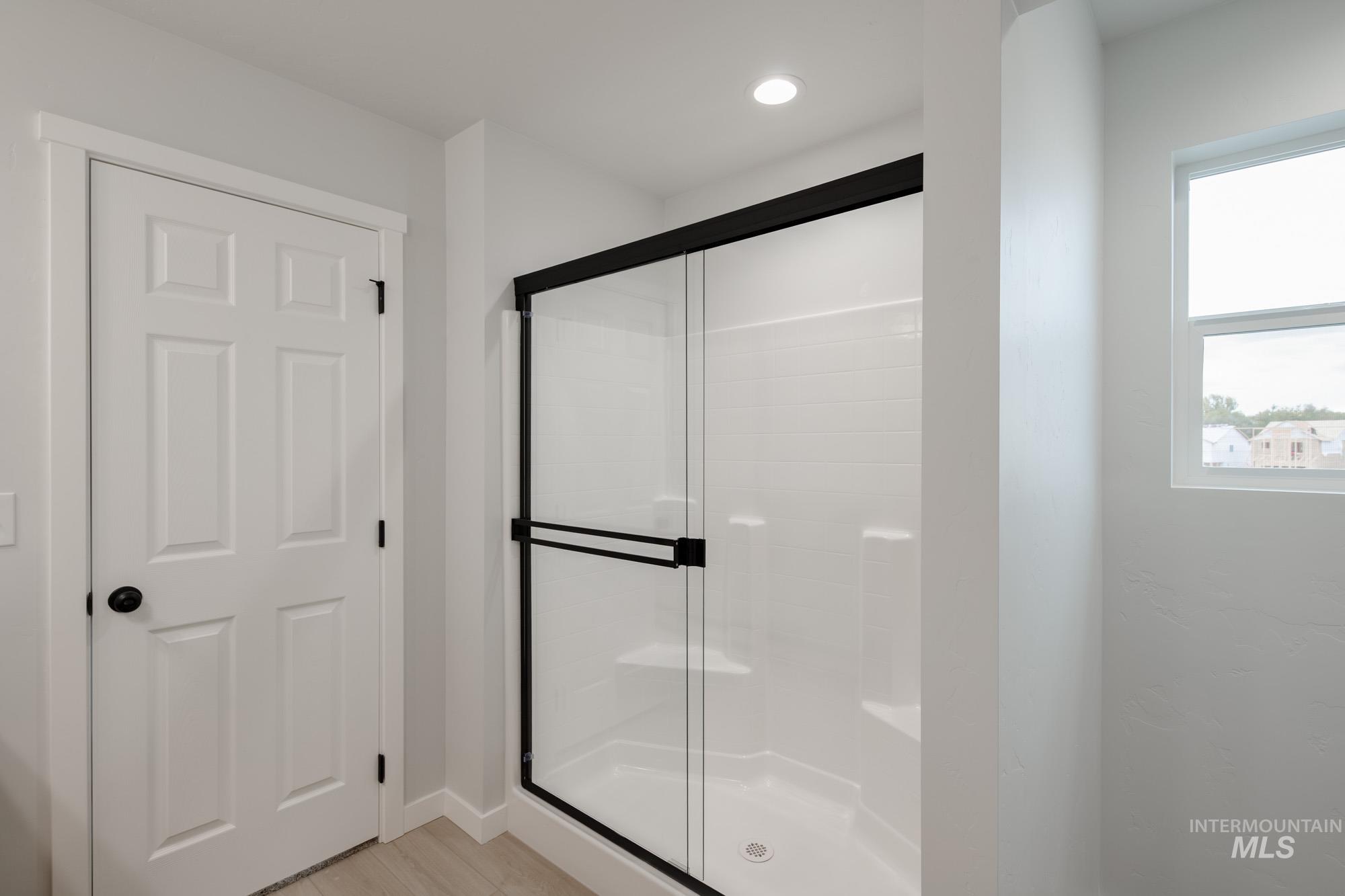 Bathroom with a stall shower