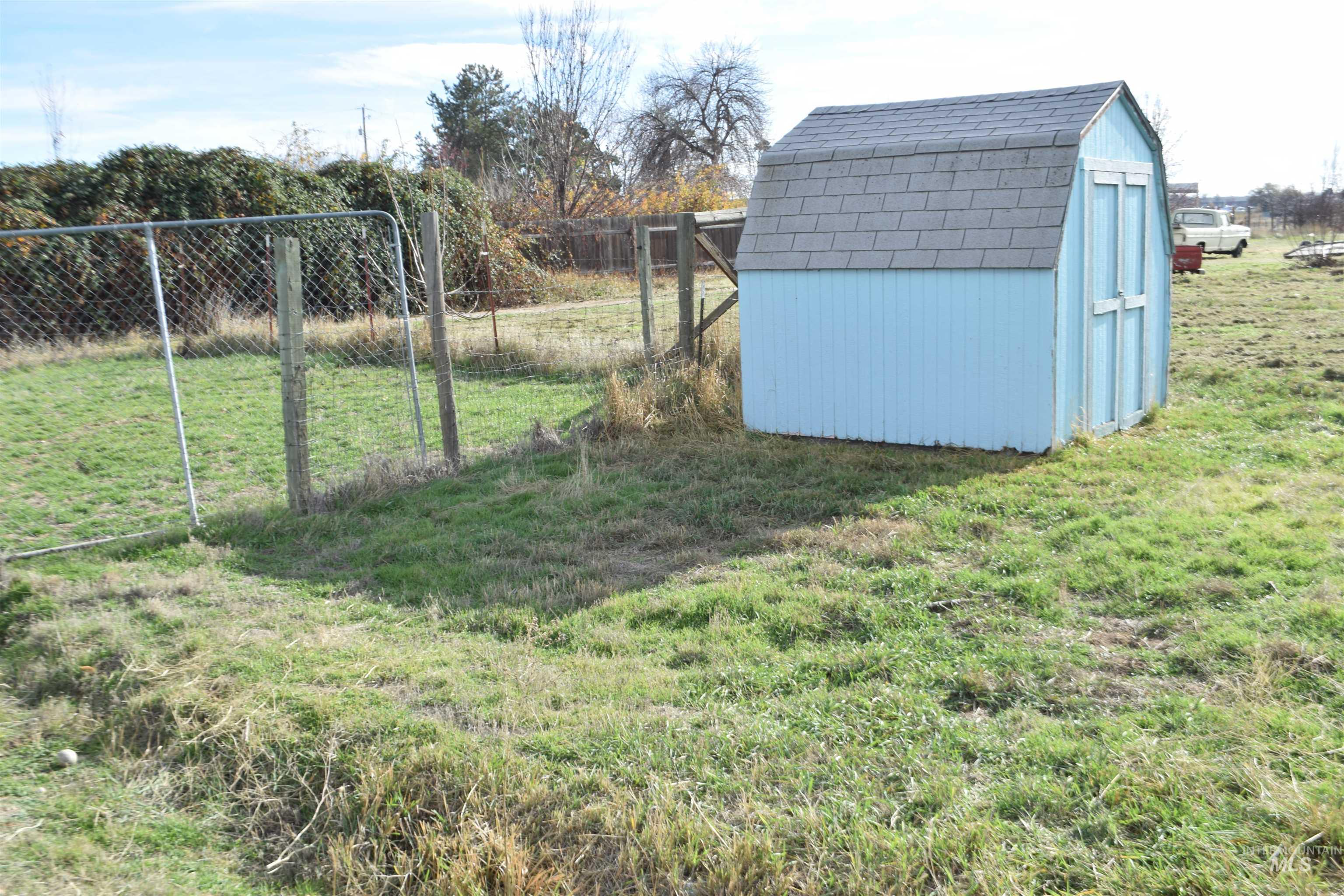 View of yard with a shed