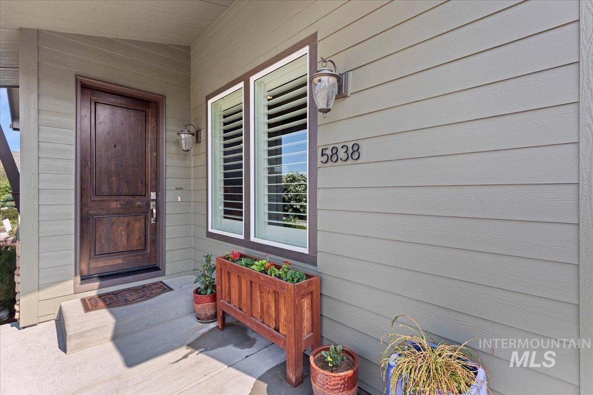 Property entrance featuring a porch
