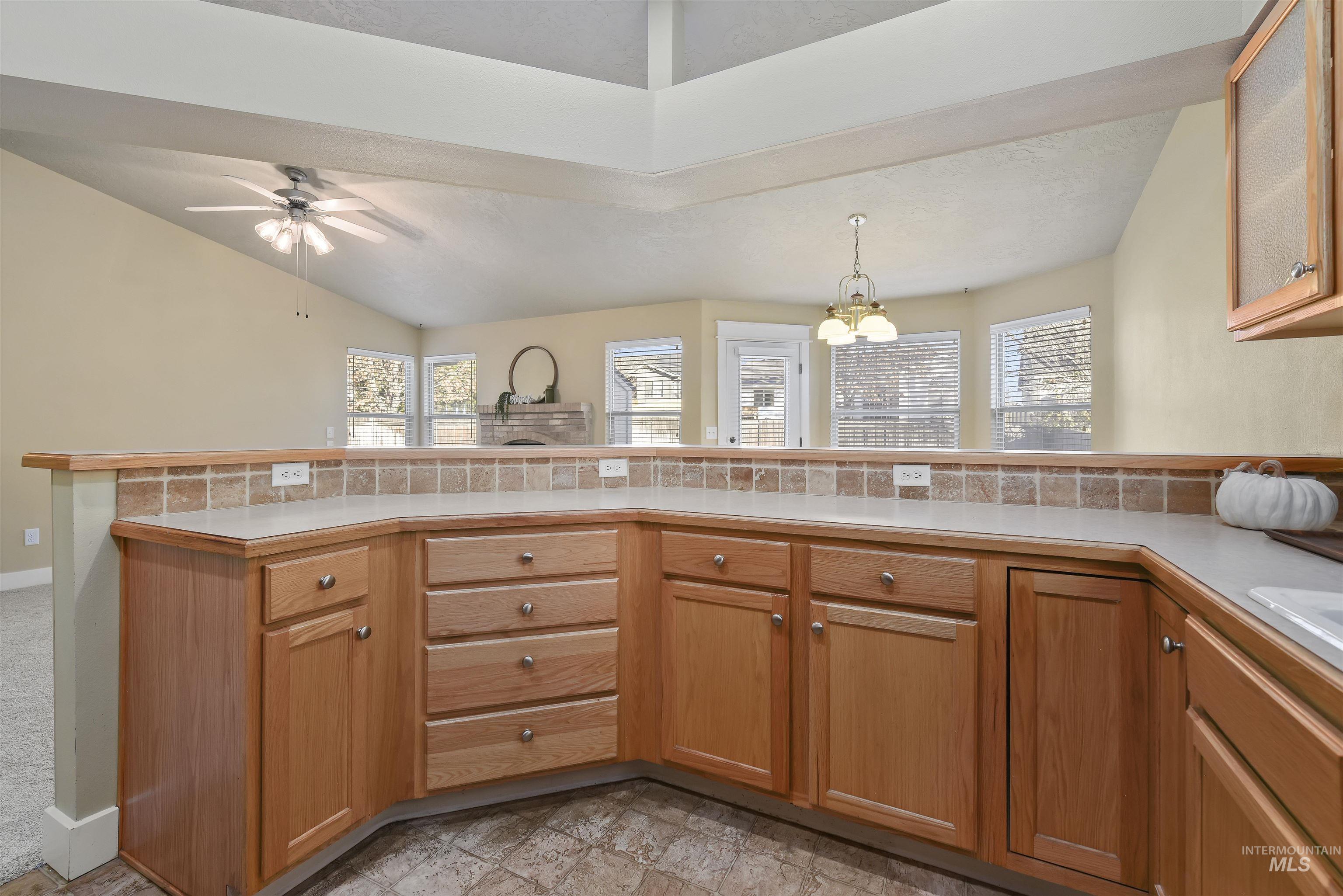 Overlooking great room, dining area and backyard.