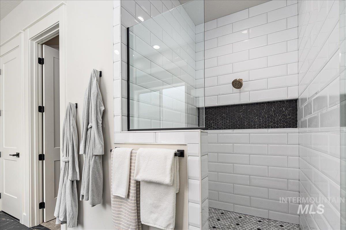 Bathroom featuring walk in shower