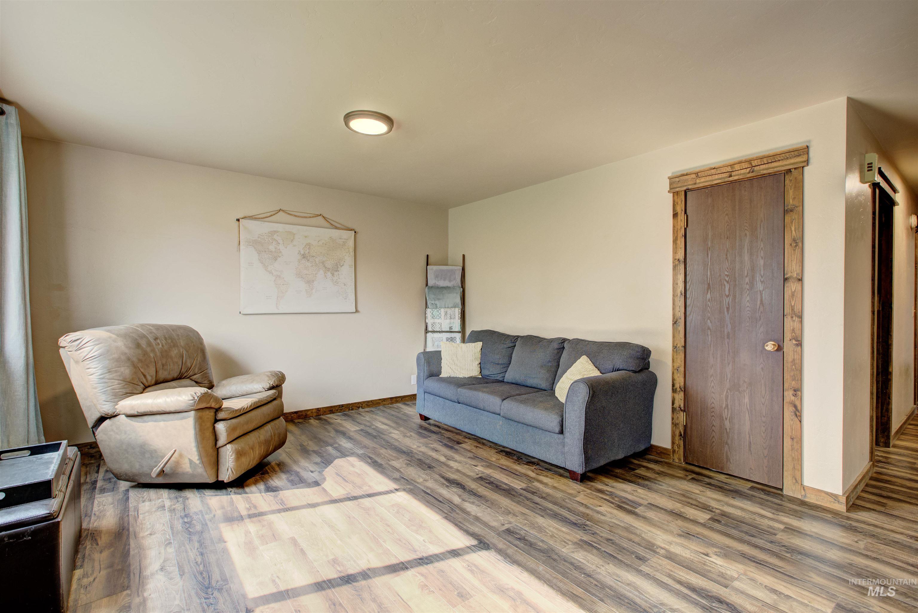 Living room featuring wood finished floors