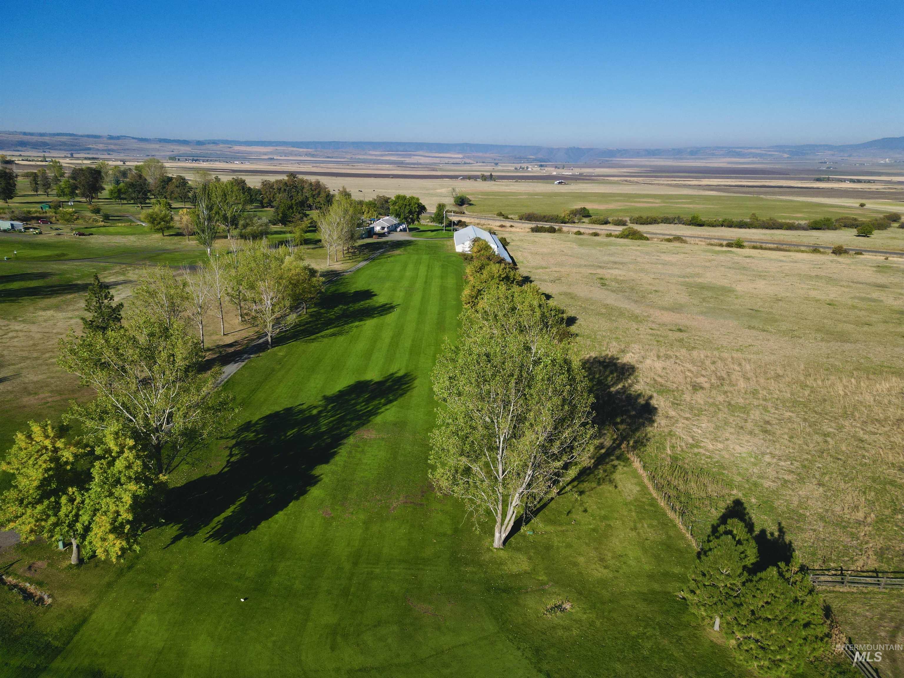 Aerial view of property's location with rural landscape