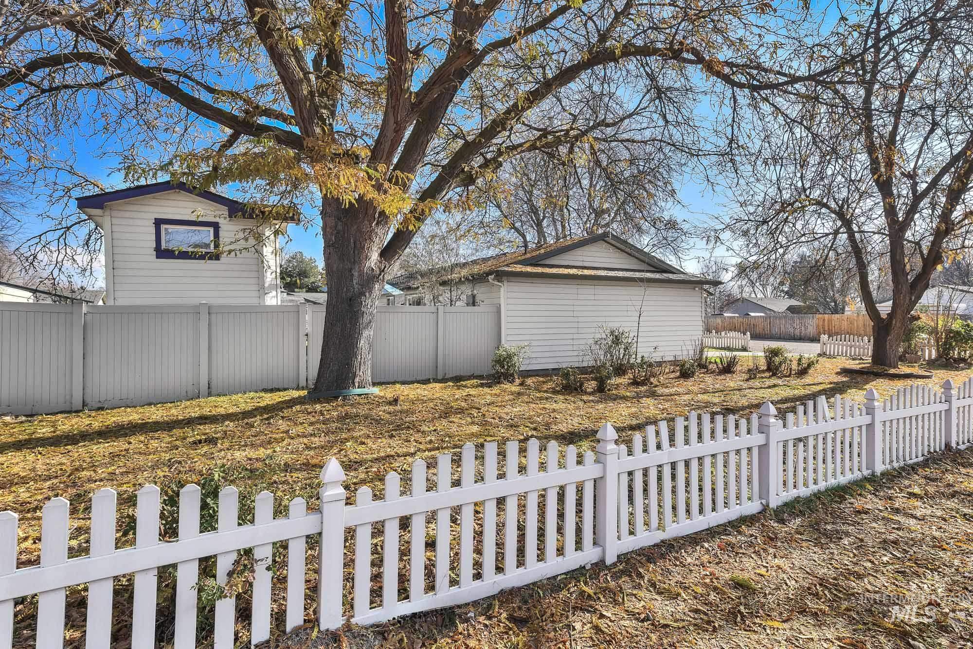 View of fenced backyard