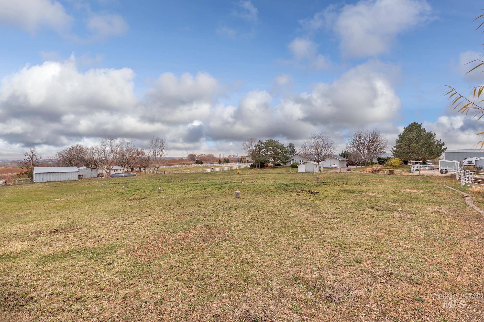 View of yard with a view of rural / pastoral area