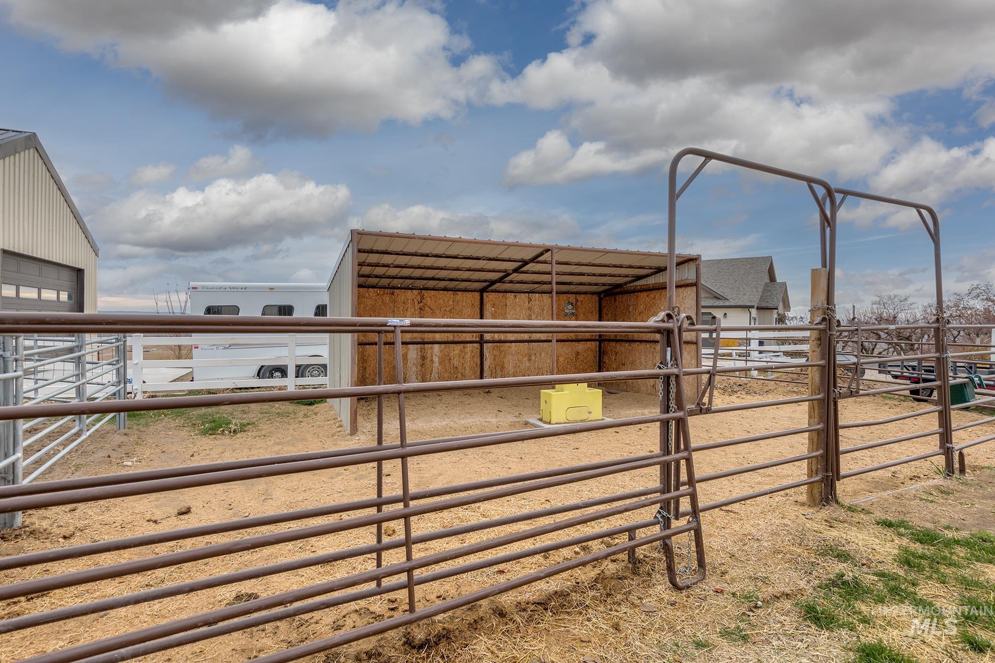 View of yard featuring an exterior structure and an outdoor structure
