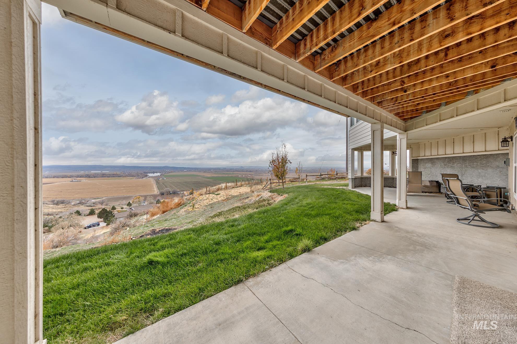 View of patio / terrace with a view of rural / pastoral area