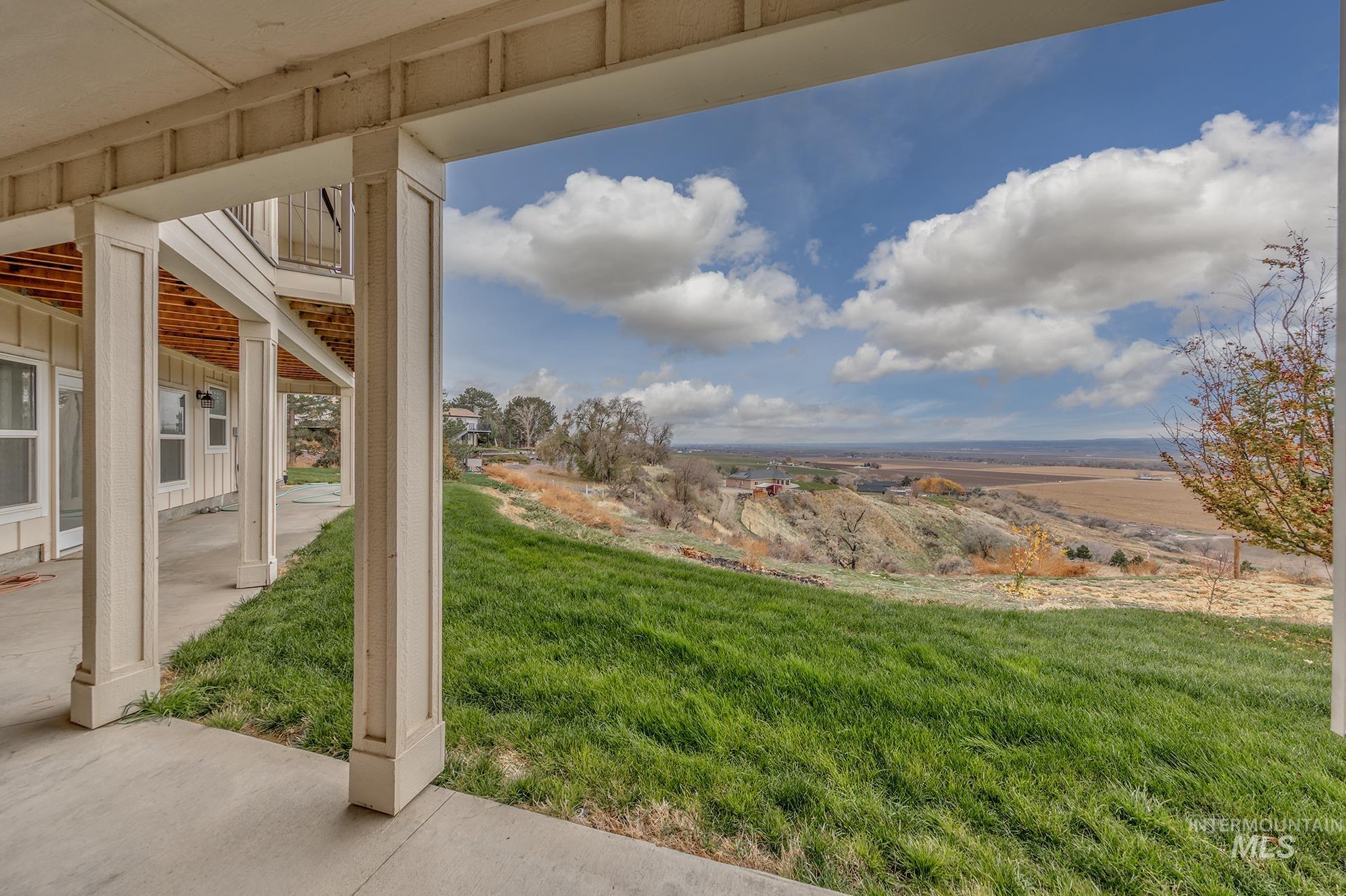 View of grassy yard featuring a view of countryside