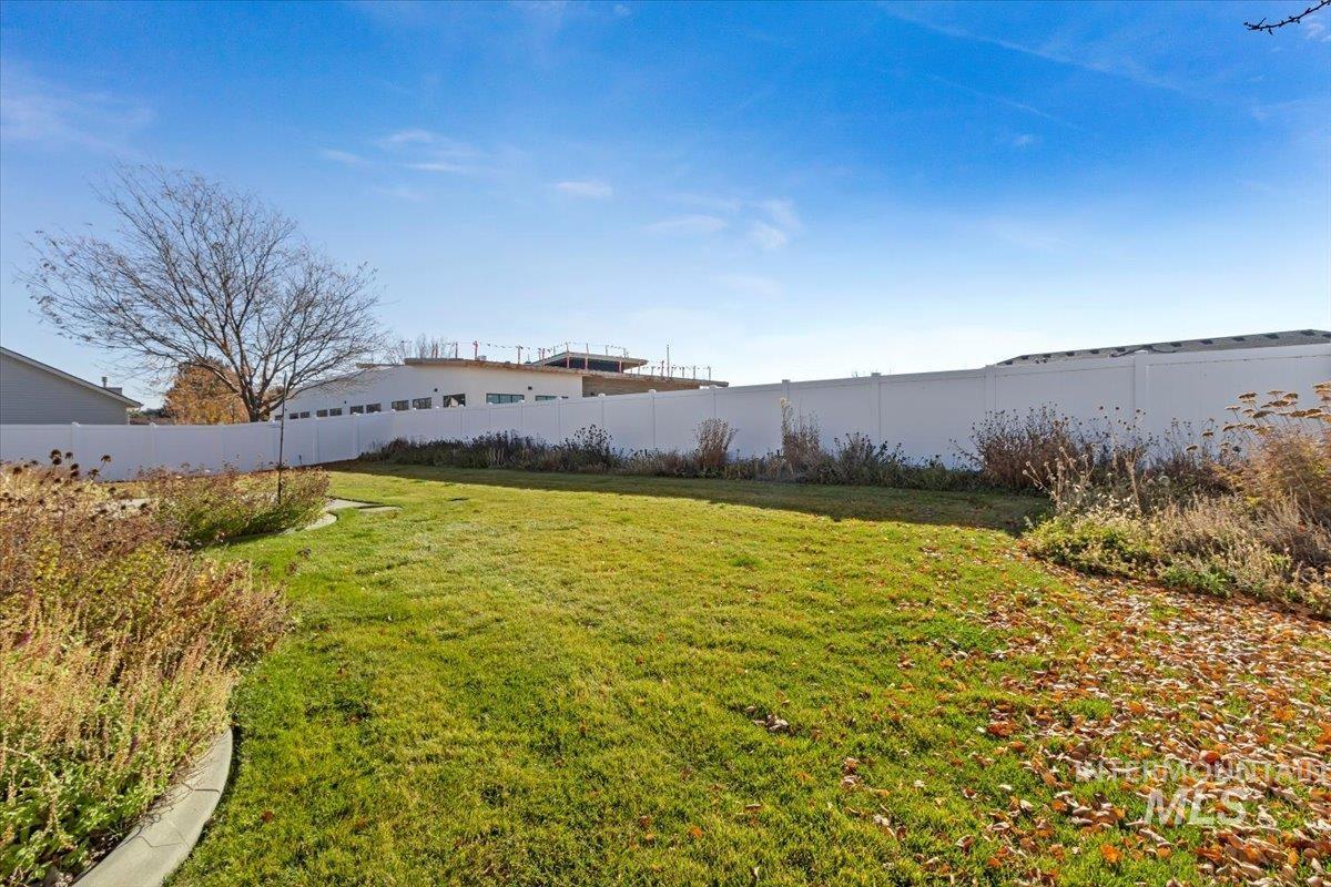 View of fenced backyard