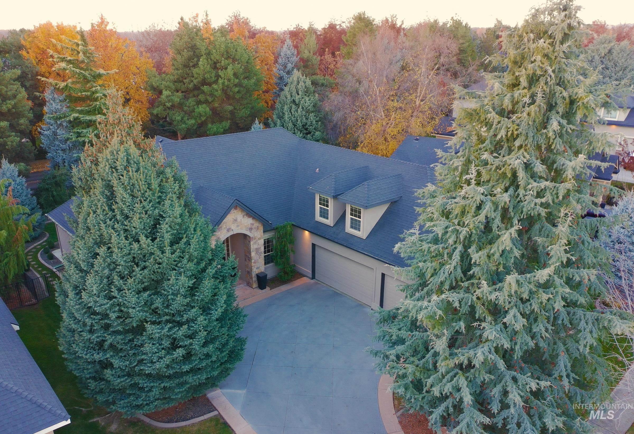 View from above of property with a forest