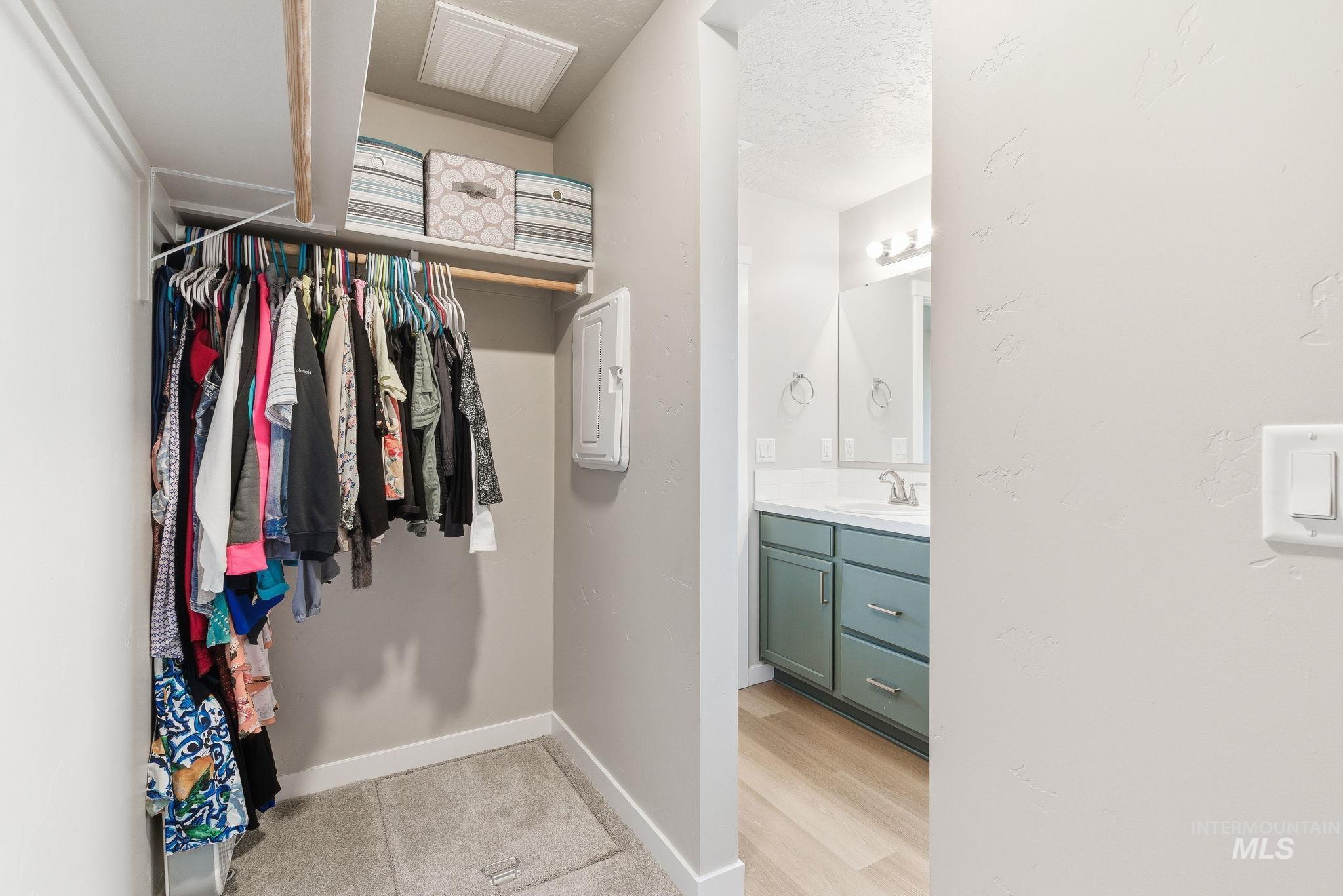 Walk in closet with a sink