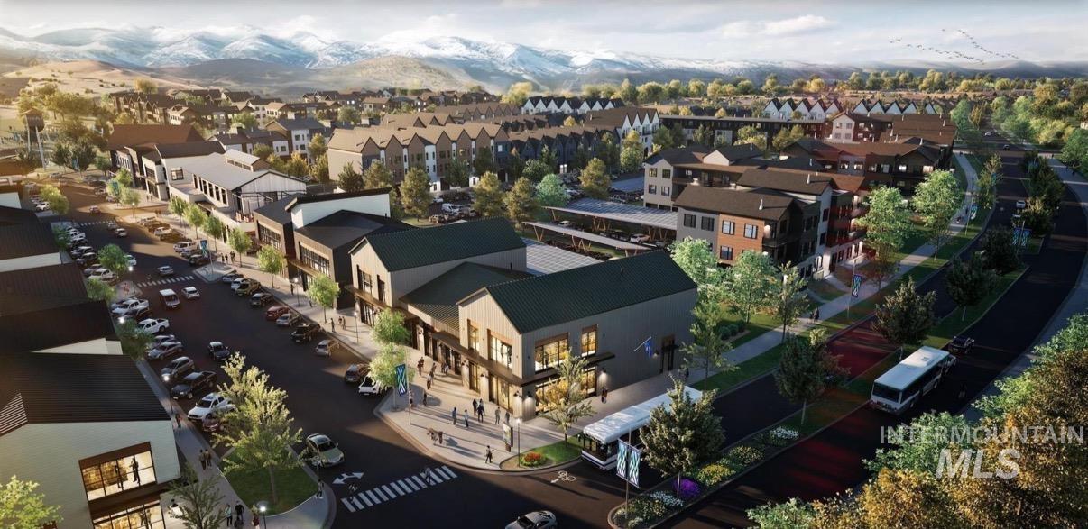 Aerial view of residential area featuring a mountain backdrop