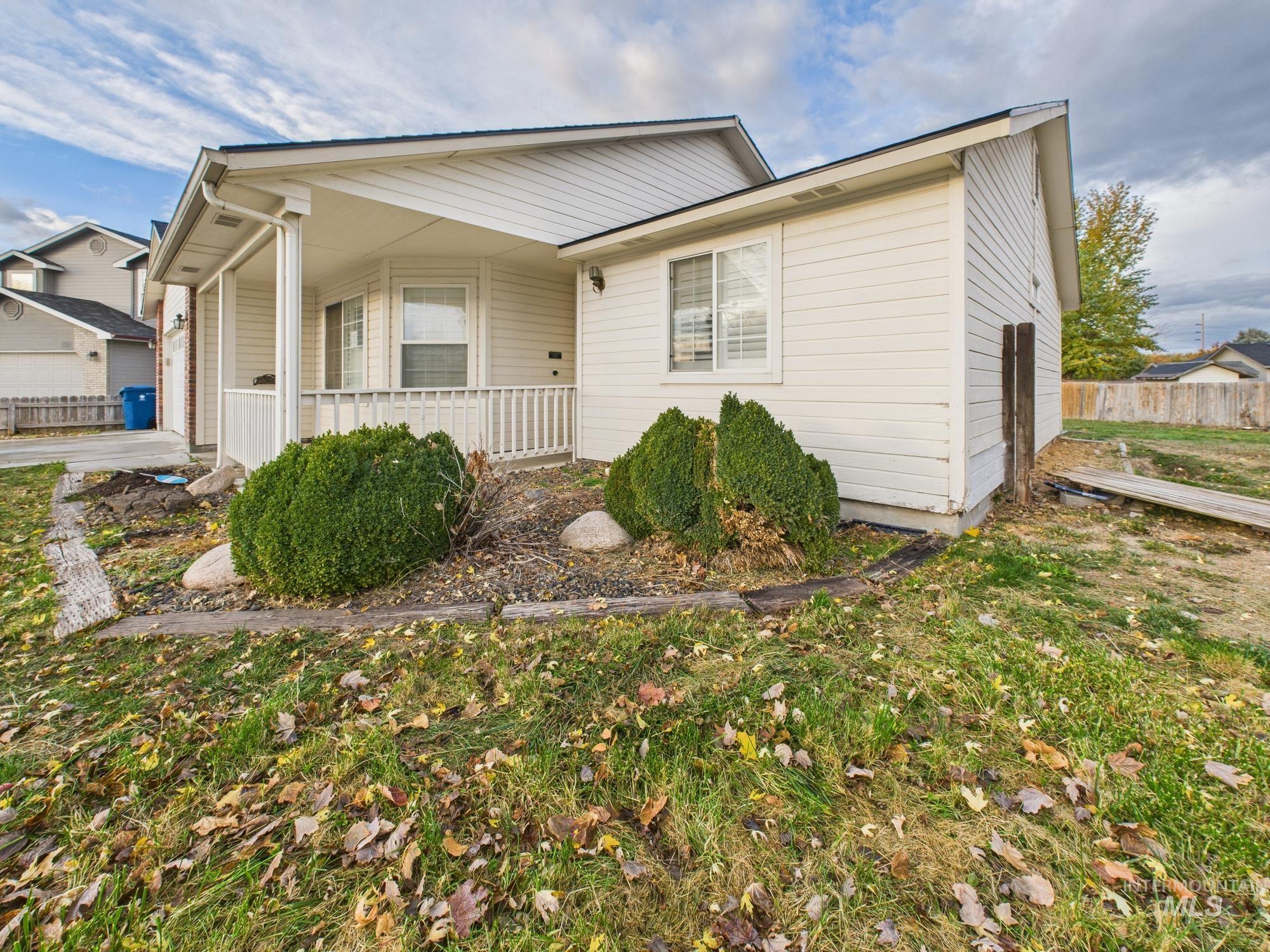 Bungalow-style home featuring covered porch
