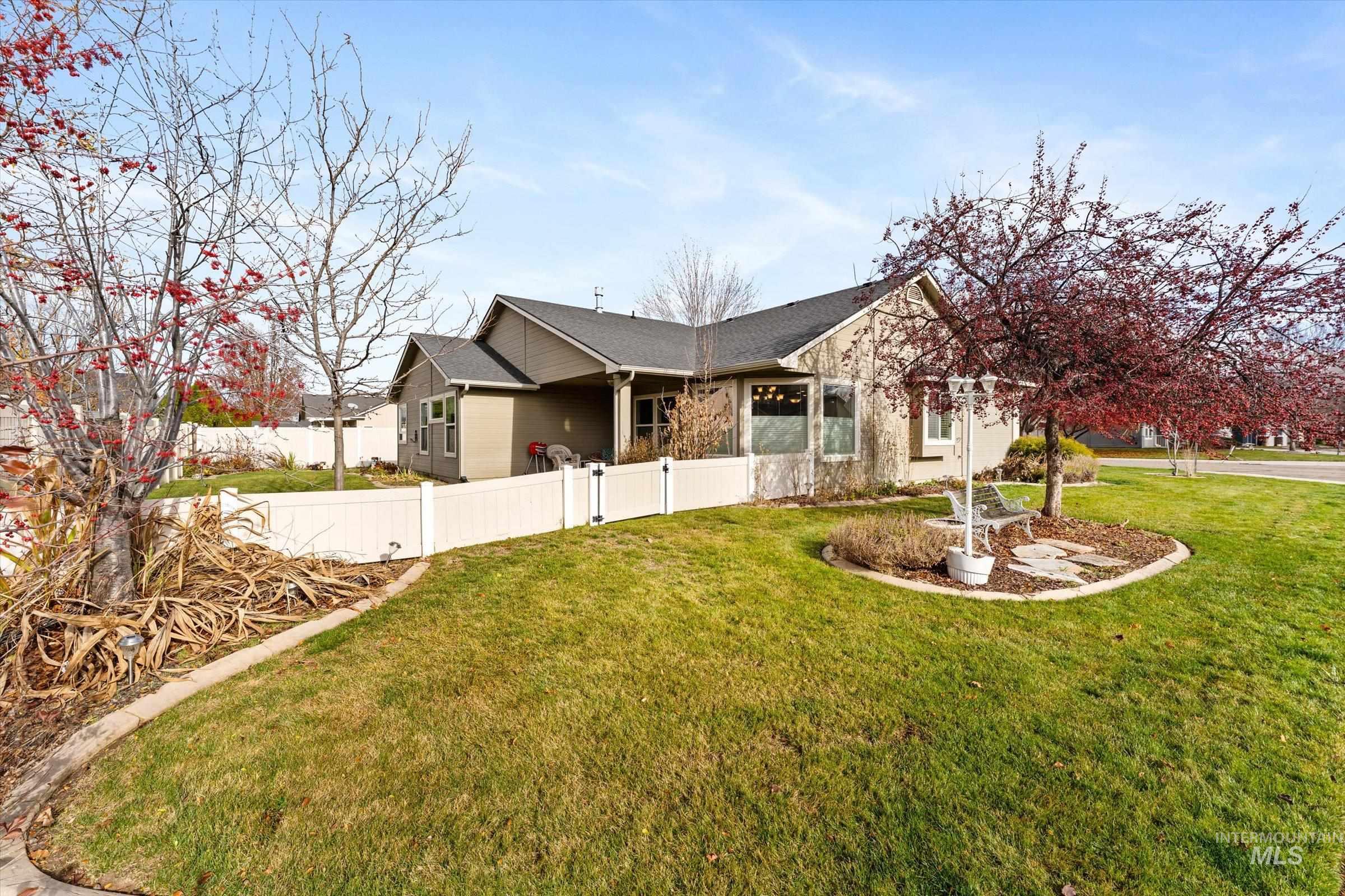 View of front of house featuring a shingled roof