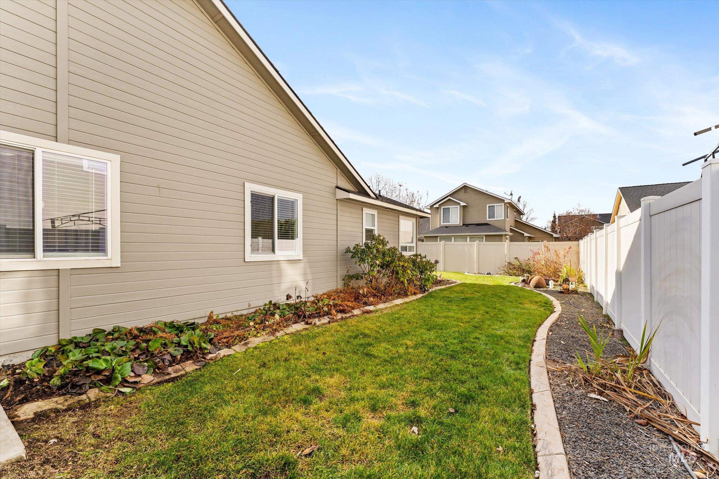 View of fenced backyard