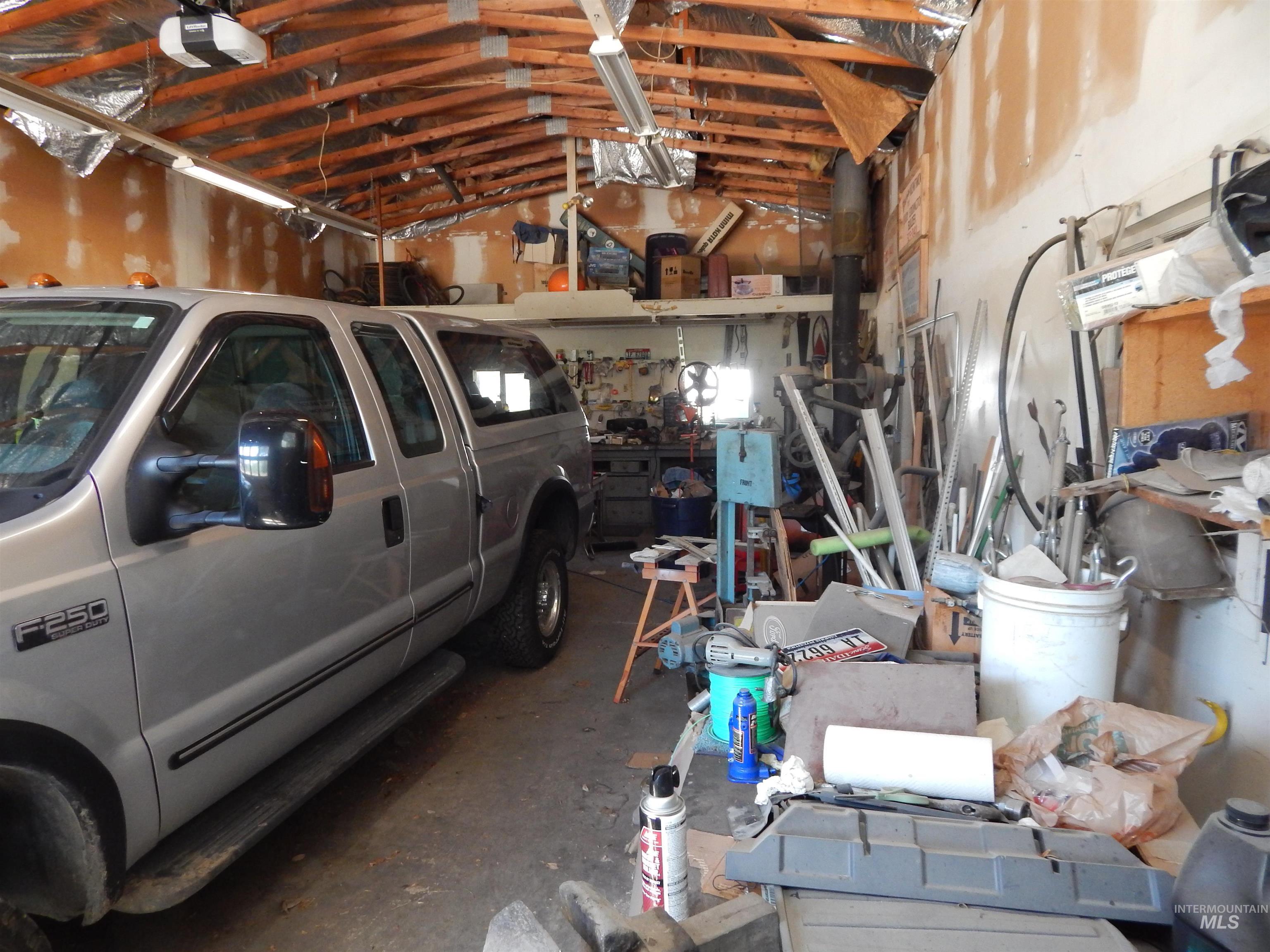 Garage featuring a garage door opener
