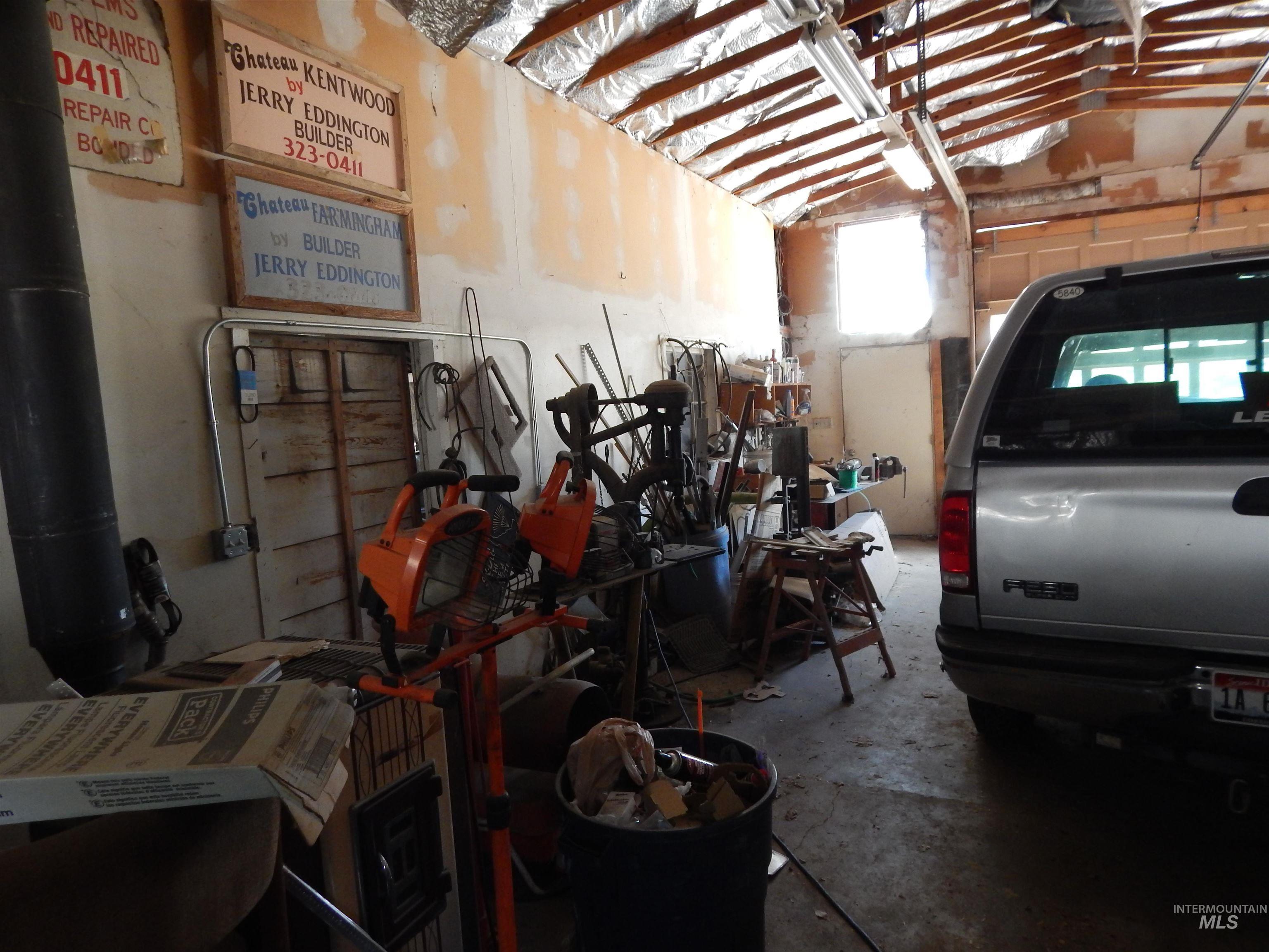 Garage with a central vacuum unit