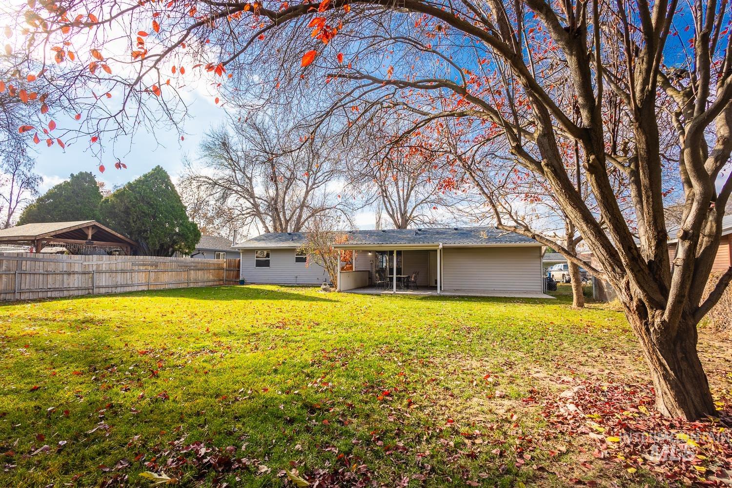 Rear view of house featuring a patio