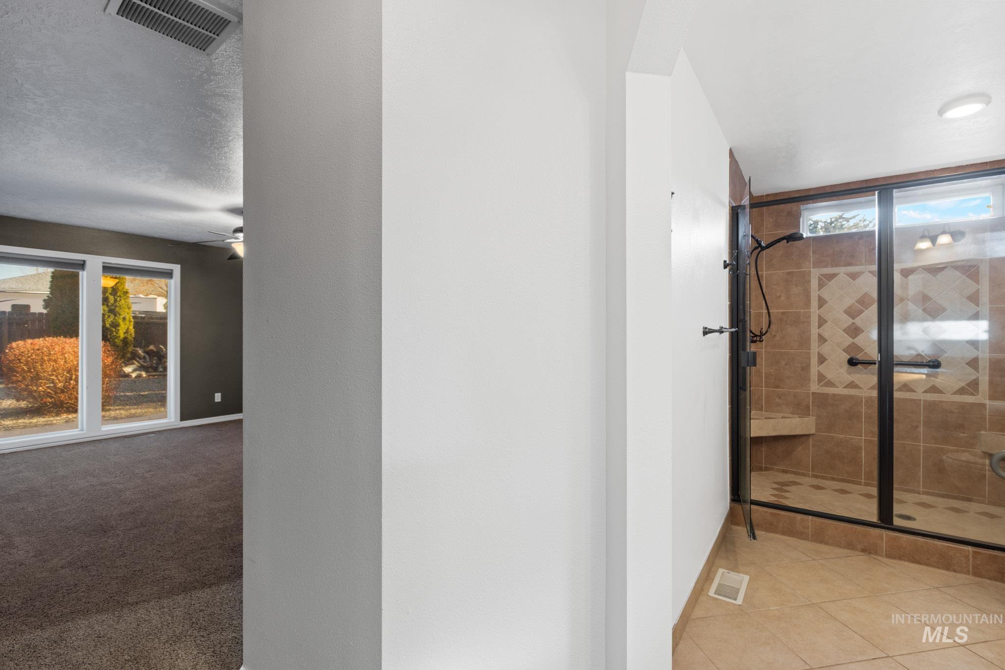 Full bathroom with a stall shower