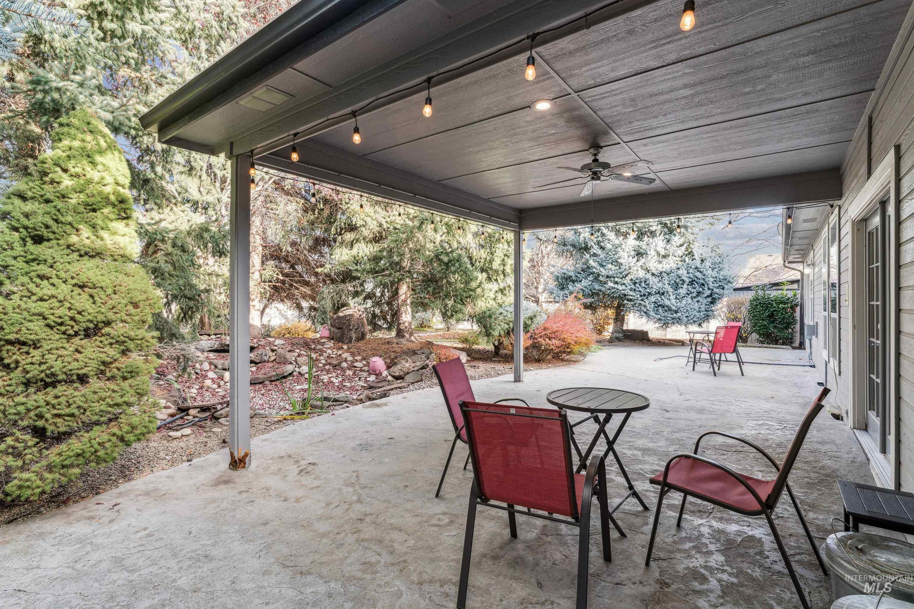 View of patio featuring ceiling fan