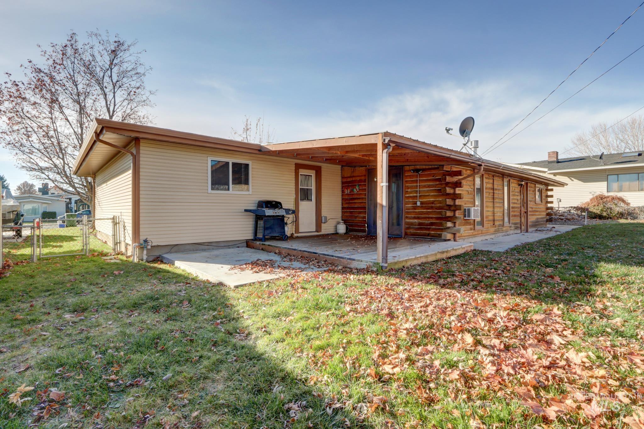 Back of house with a gate