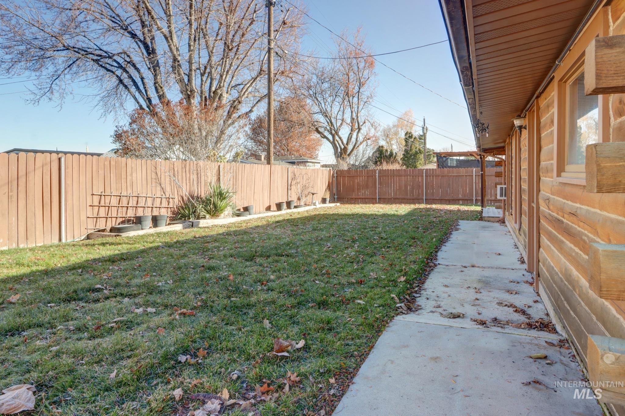 View of fenced backyard