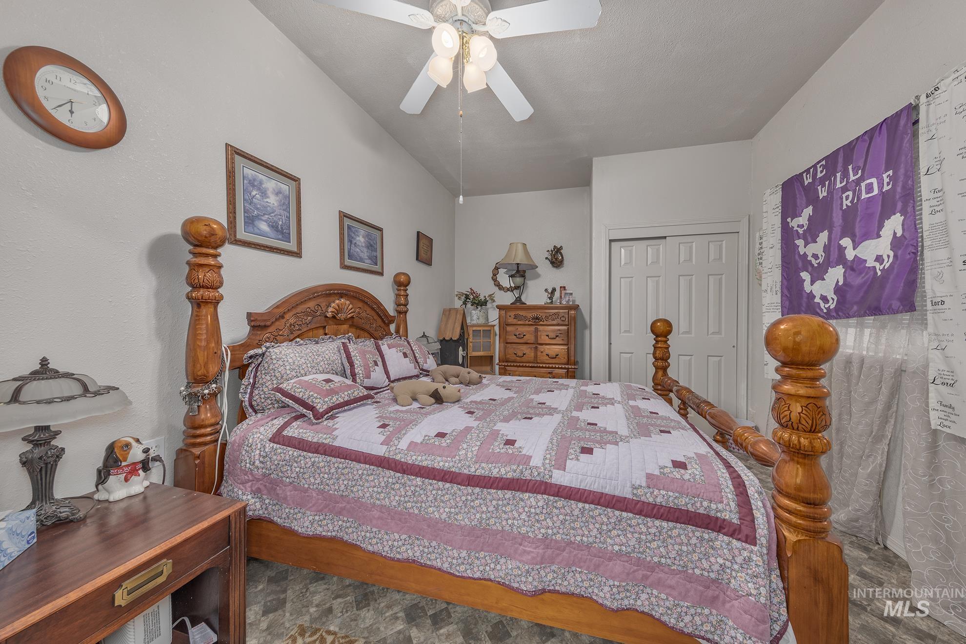 Bedroom with a closet and ceiling fan