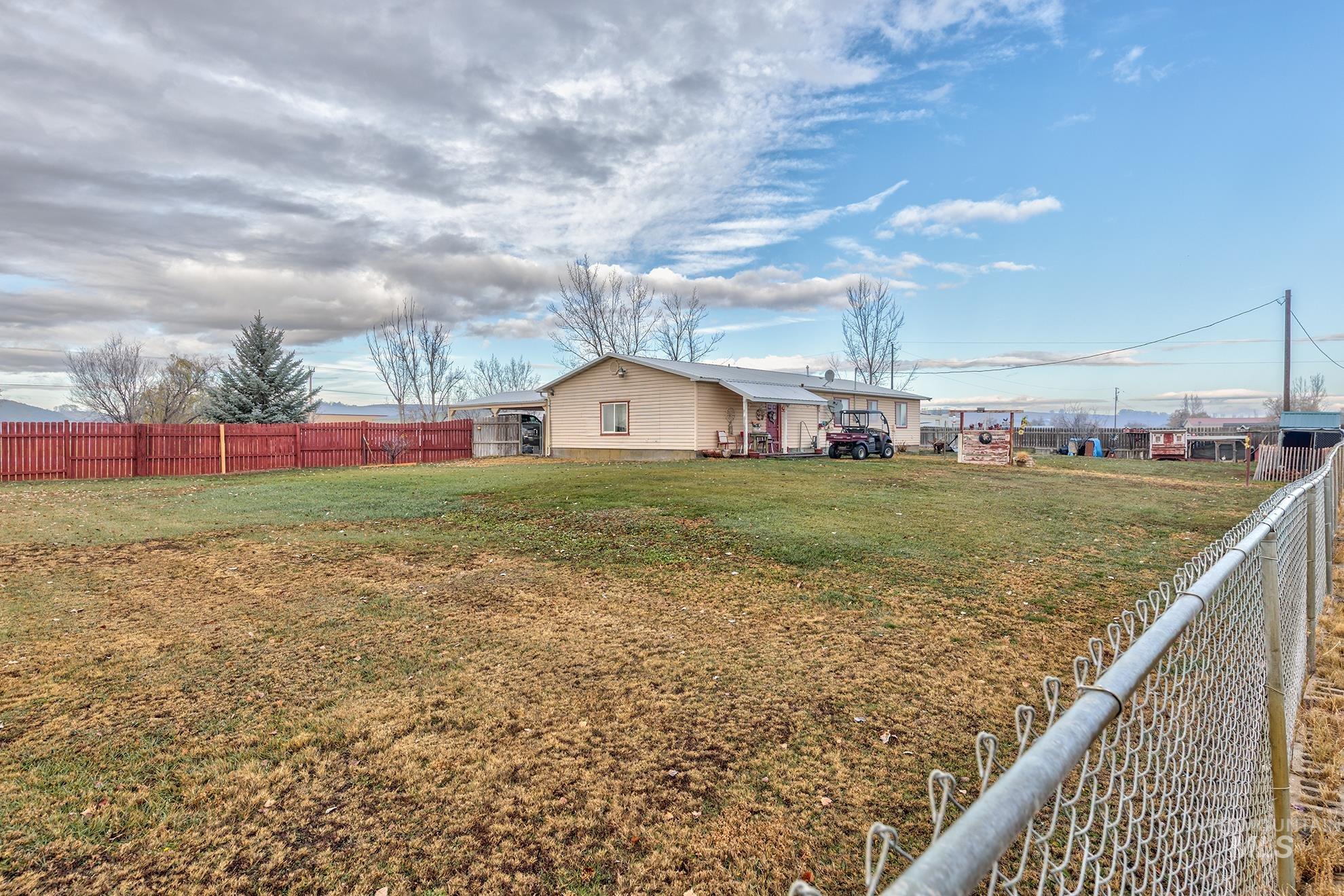 View of fenced backyard