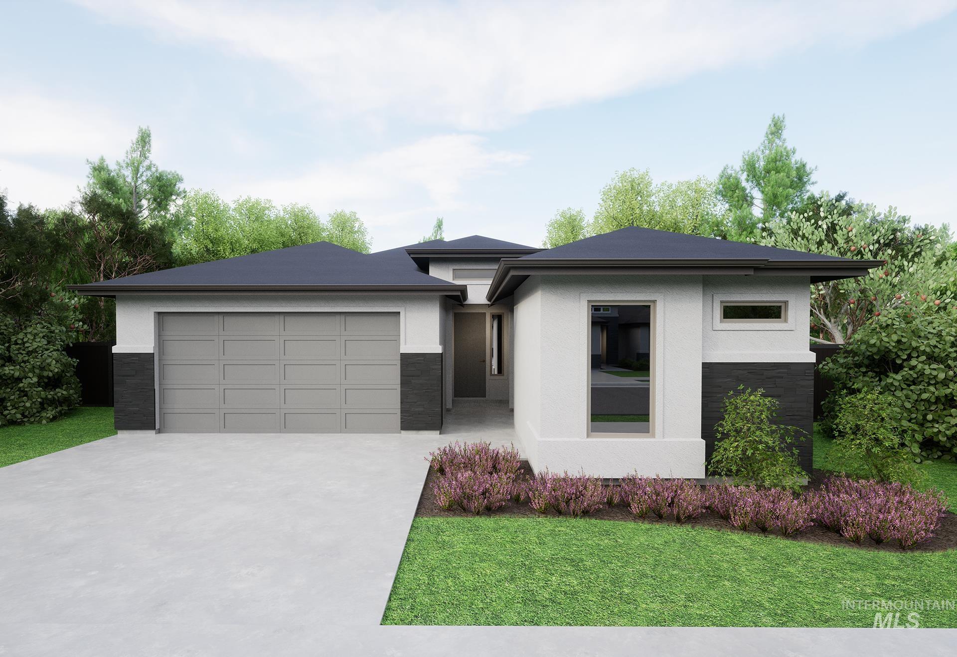 Prairie-style home featuring stucco siding, stone siding, concrete driveway, and a front lawn