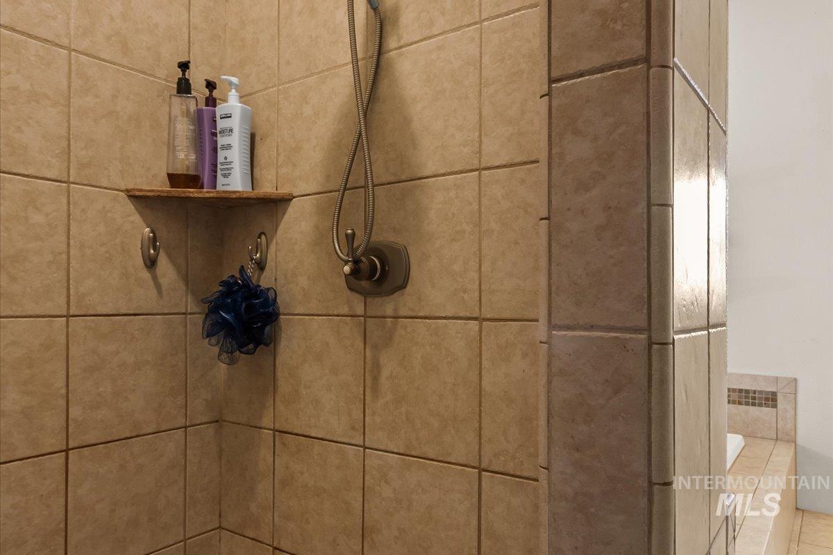 Bathroom view of tiled shower