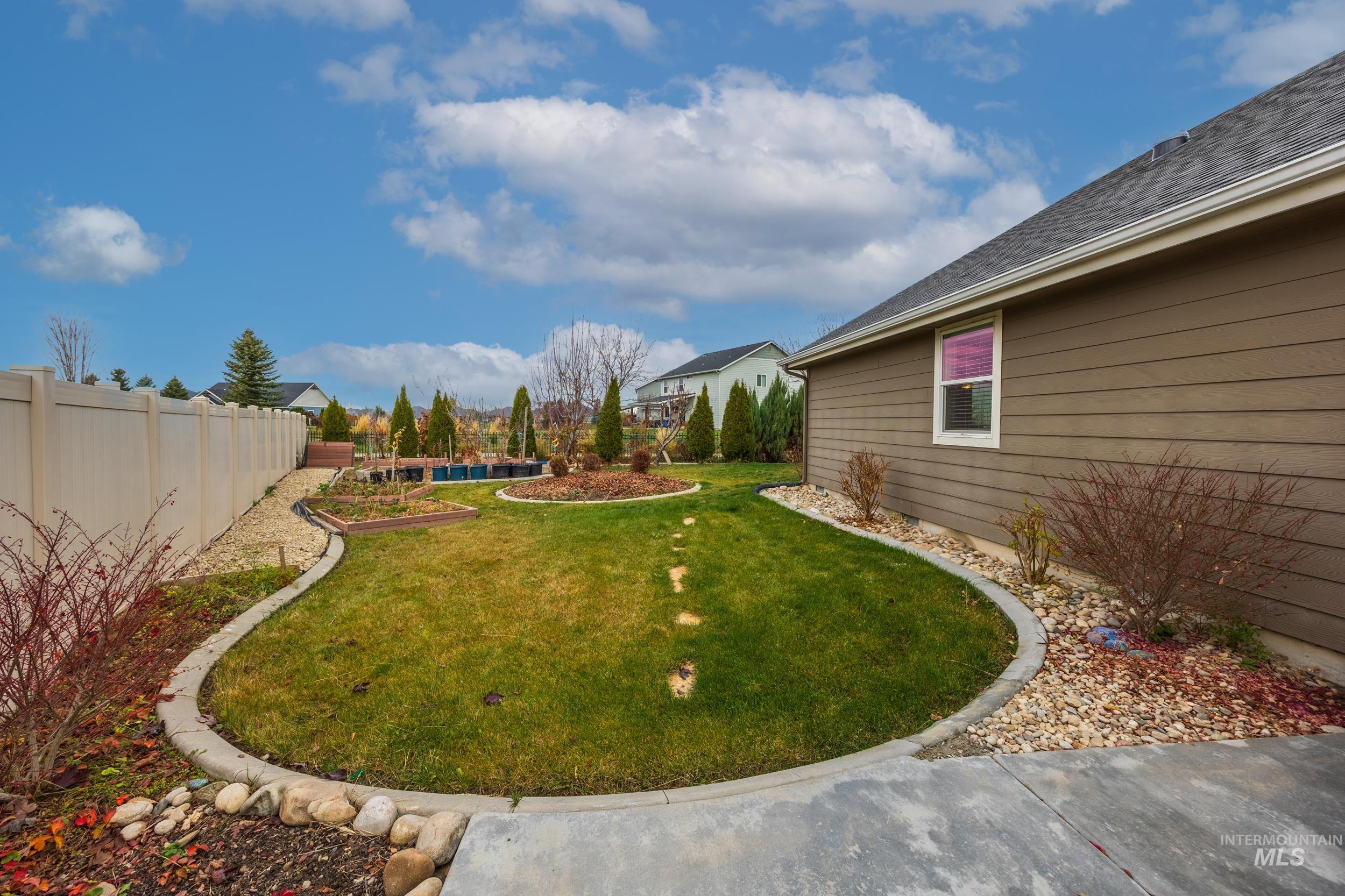 View of fenced backyard