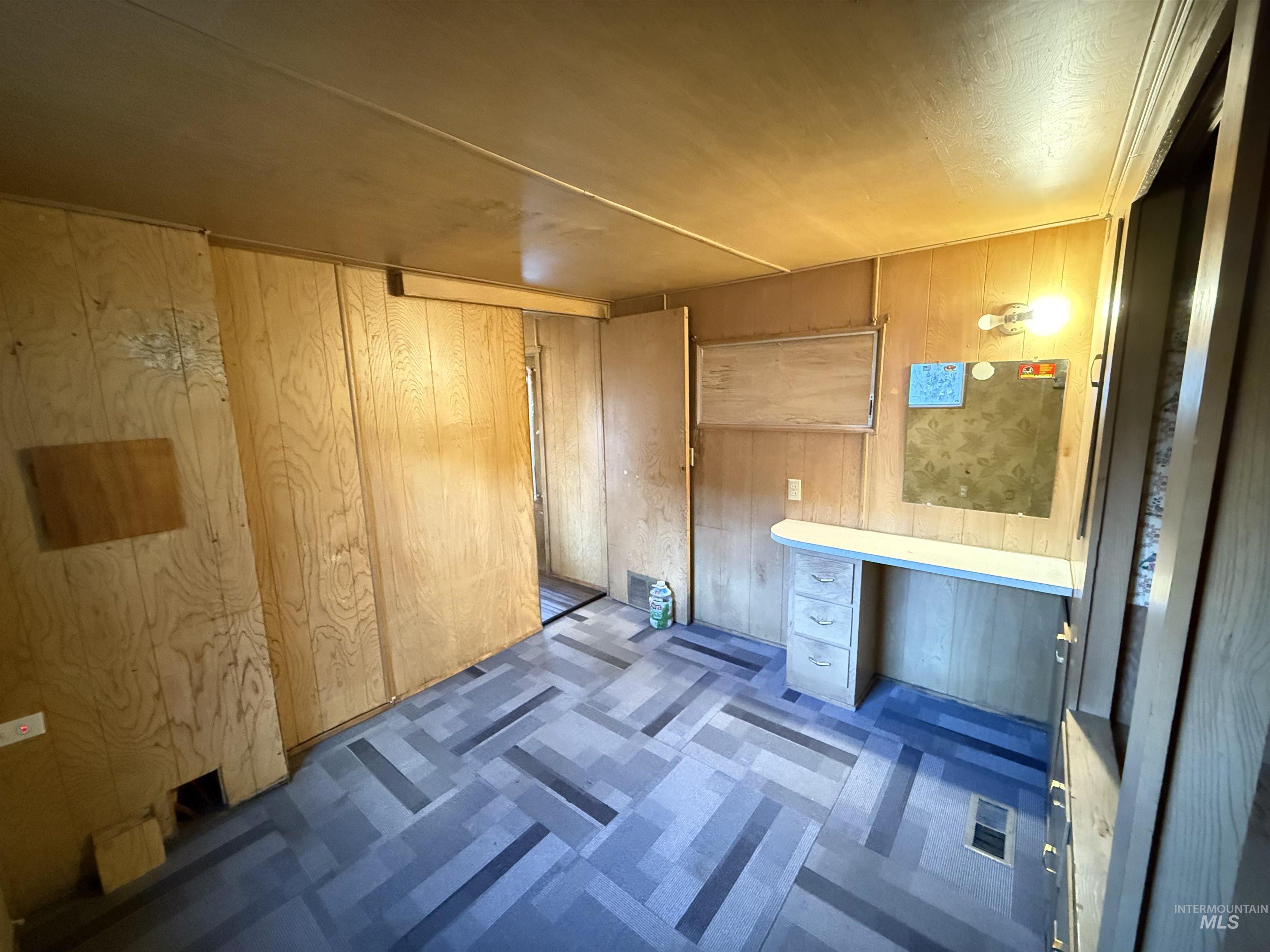 Bathroom with wooden walls