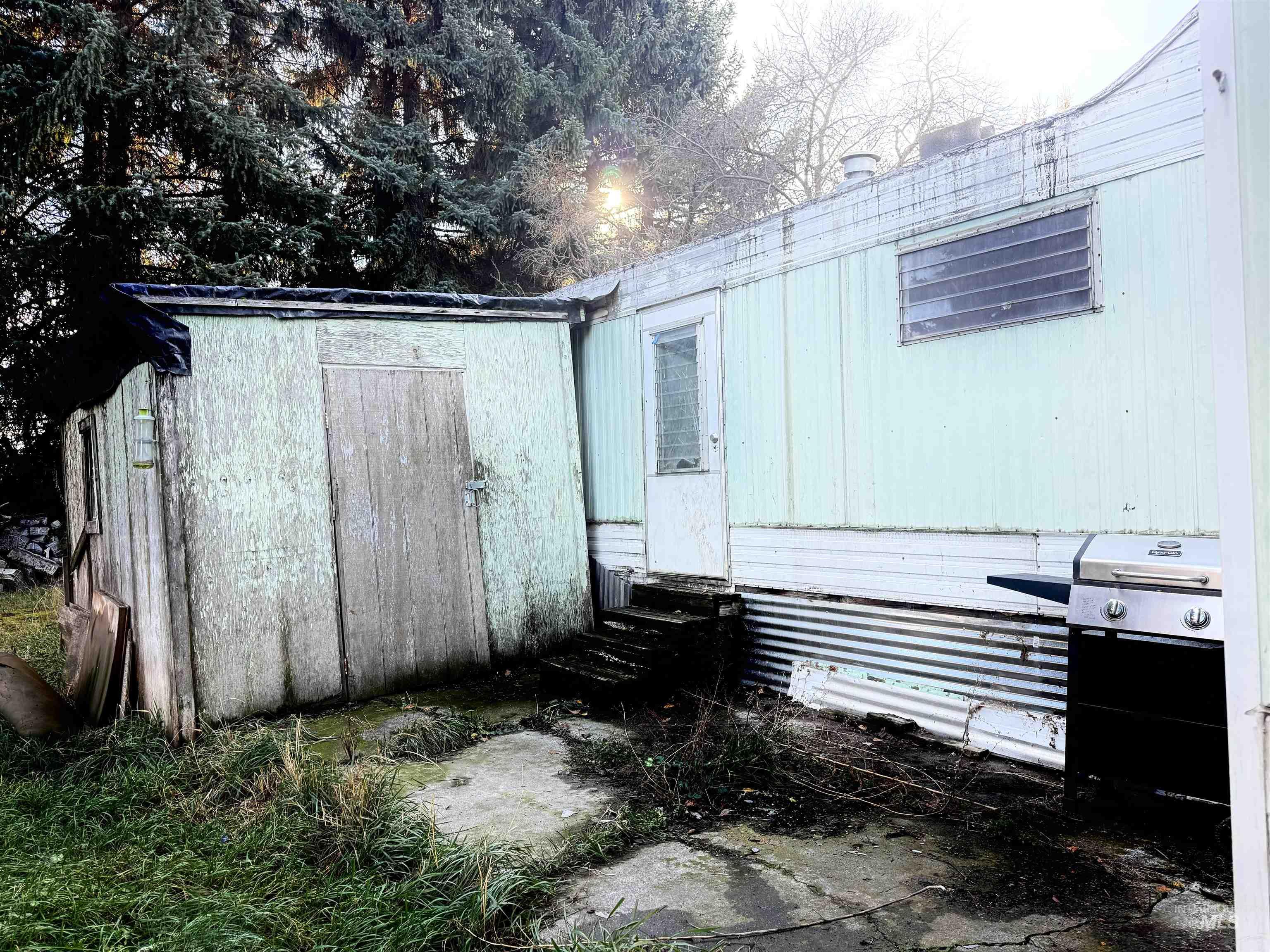 View of outdoor structure with entry steps