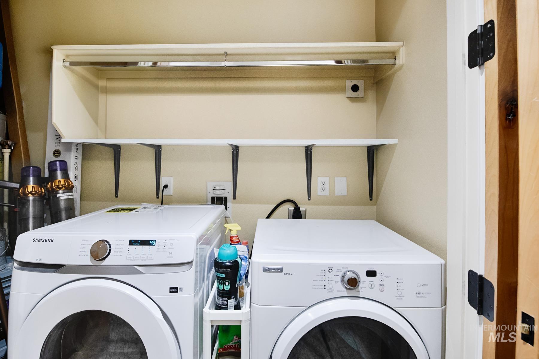Laundry room with washer and dryer
