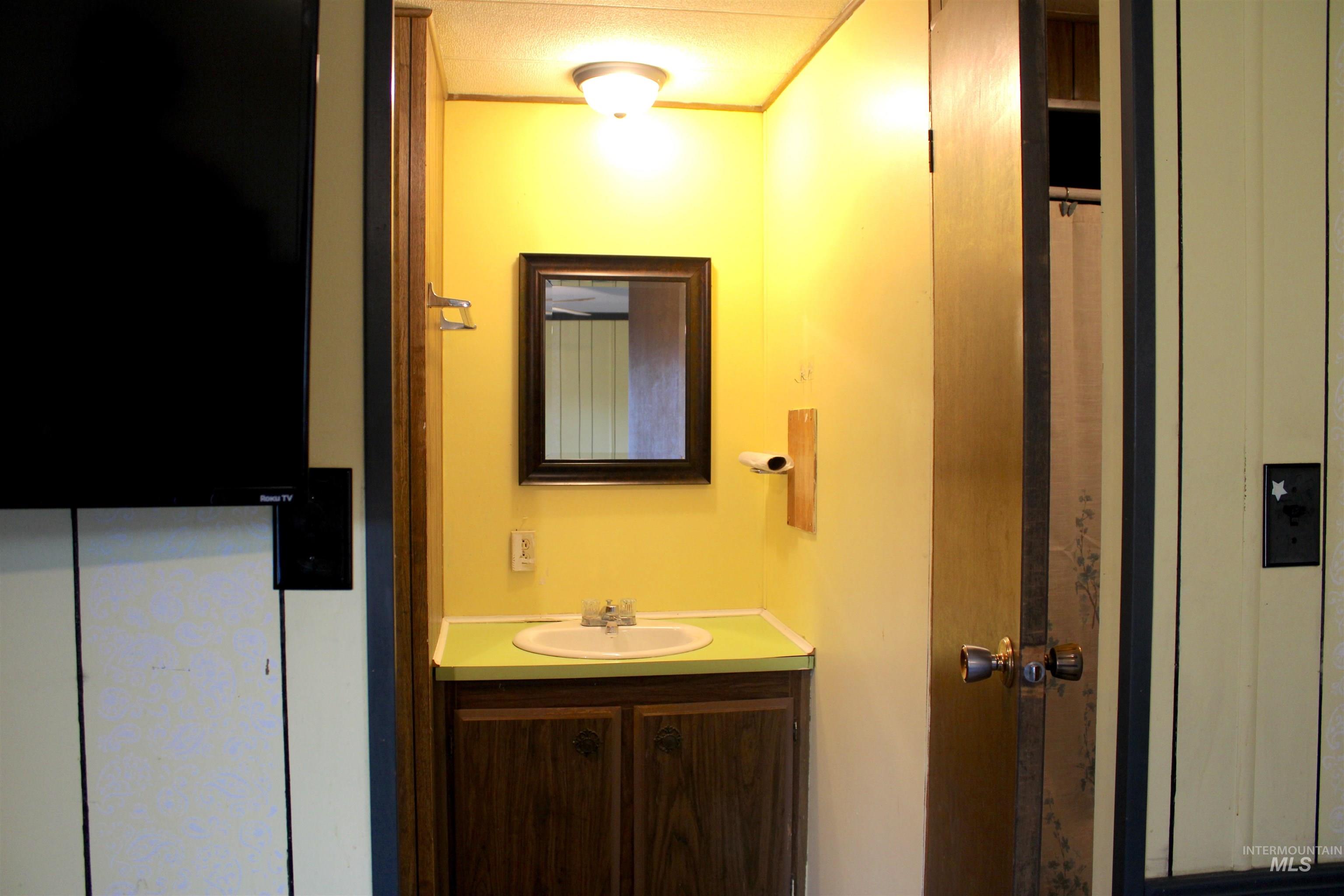 Bathroom featuring vanity