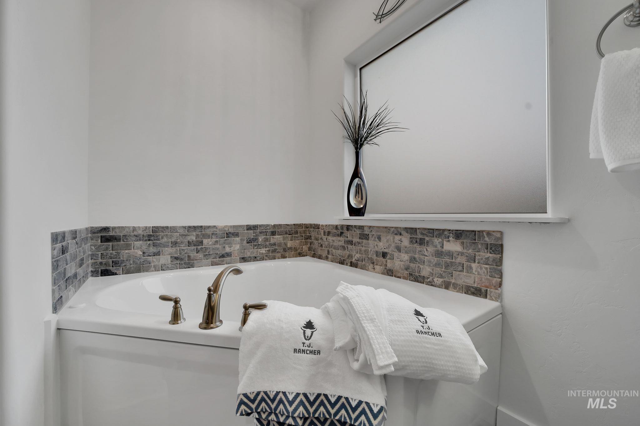 Bathroom featuring a bath