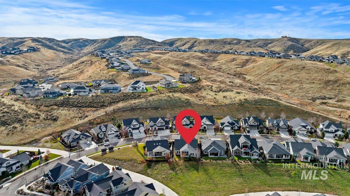 View of property location with nearby suburban area and a mountain backdrop