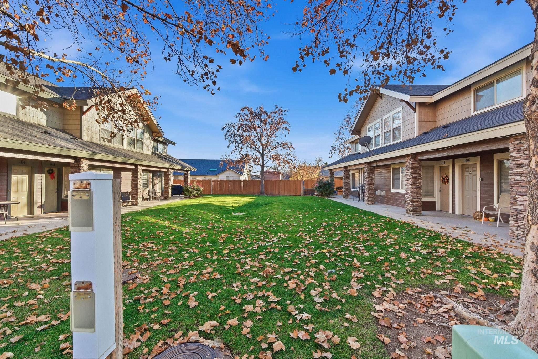 Fenced backyard with a patio area
