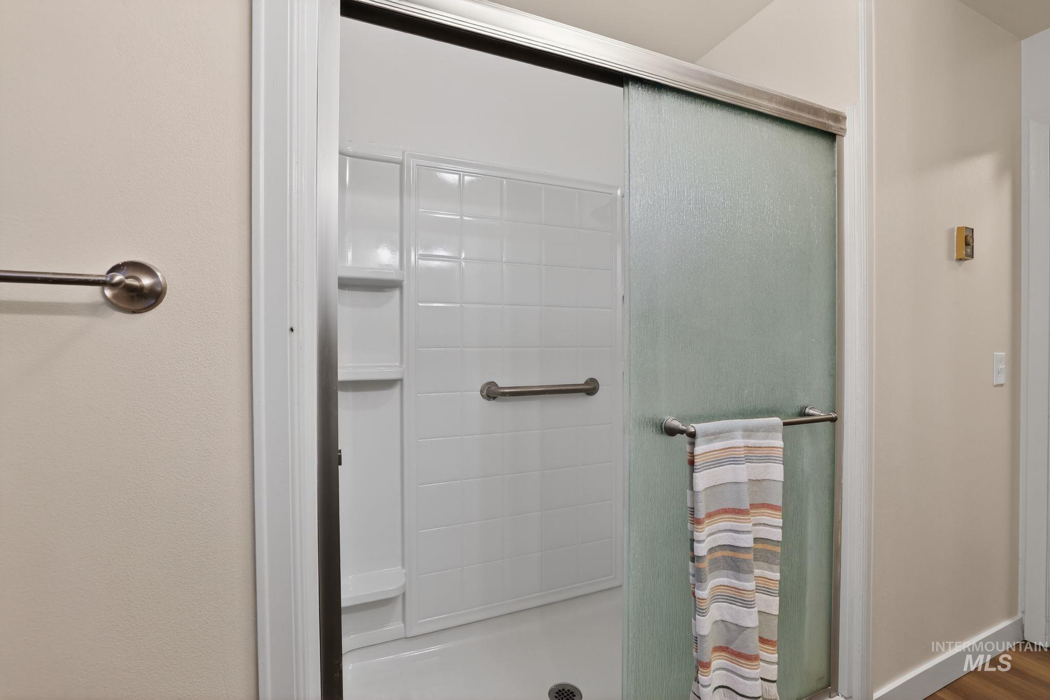 Bathroom featuring a stall shower