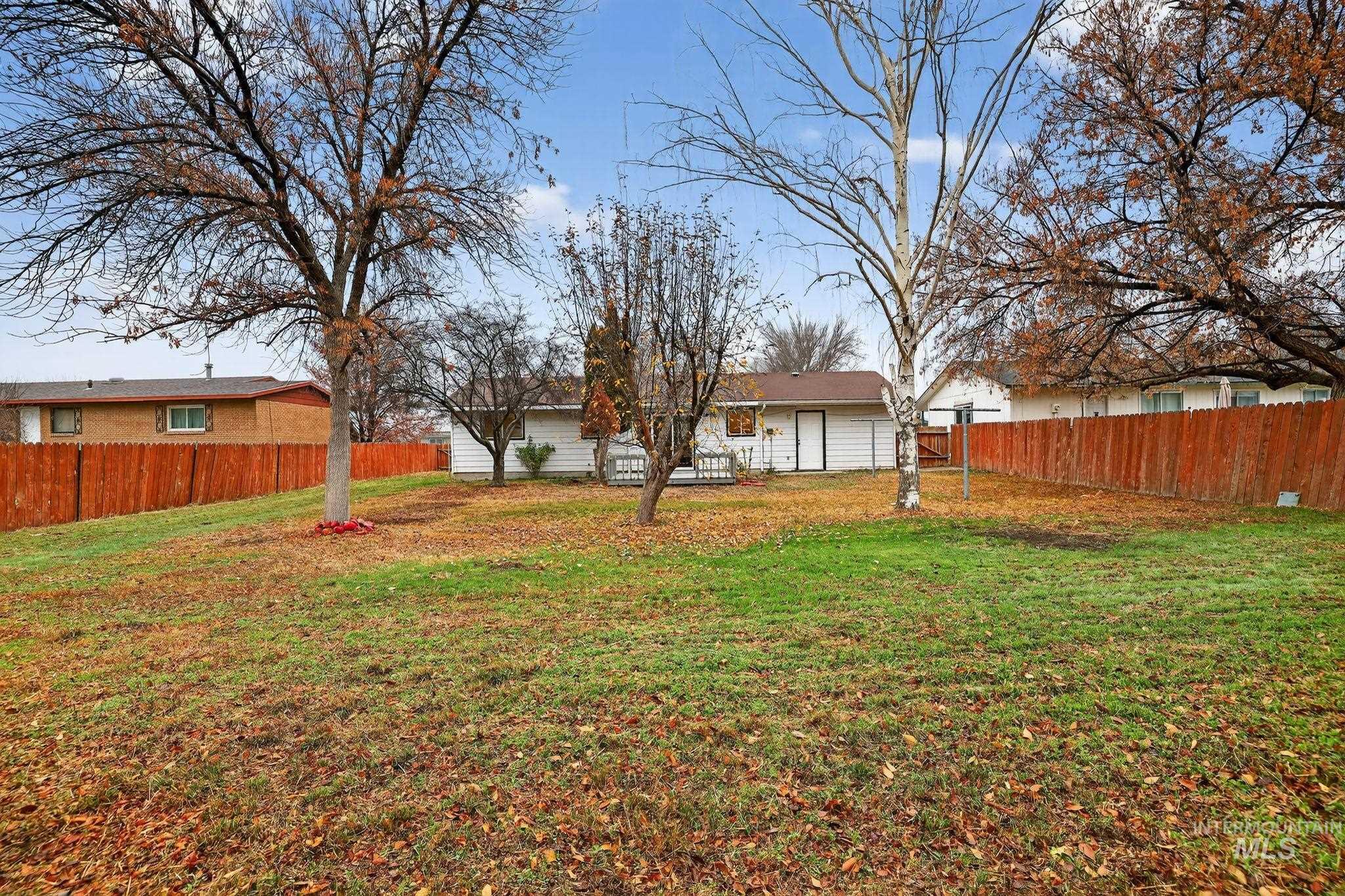 View of fenced backyard