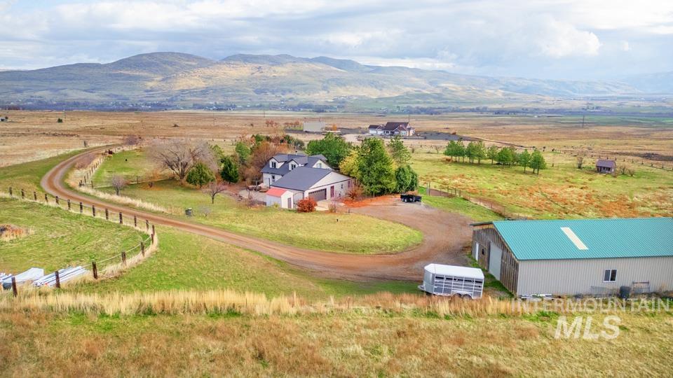 Overview of rural landscape with a mountain backdrop