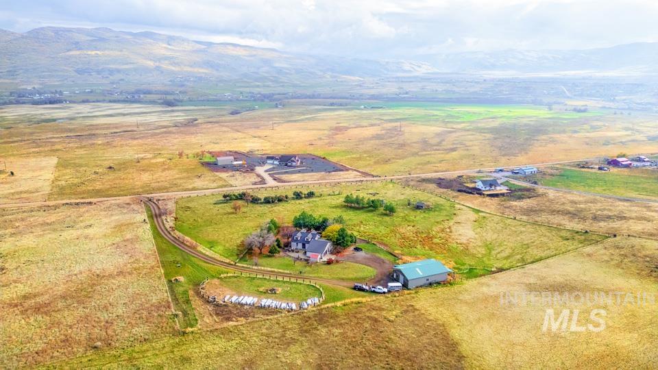 Aerial view of sparsely populated area with mountains
