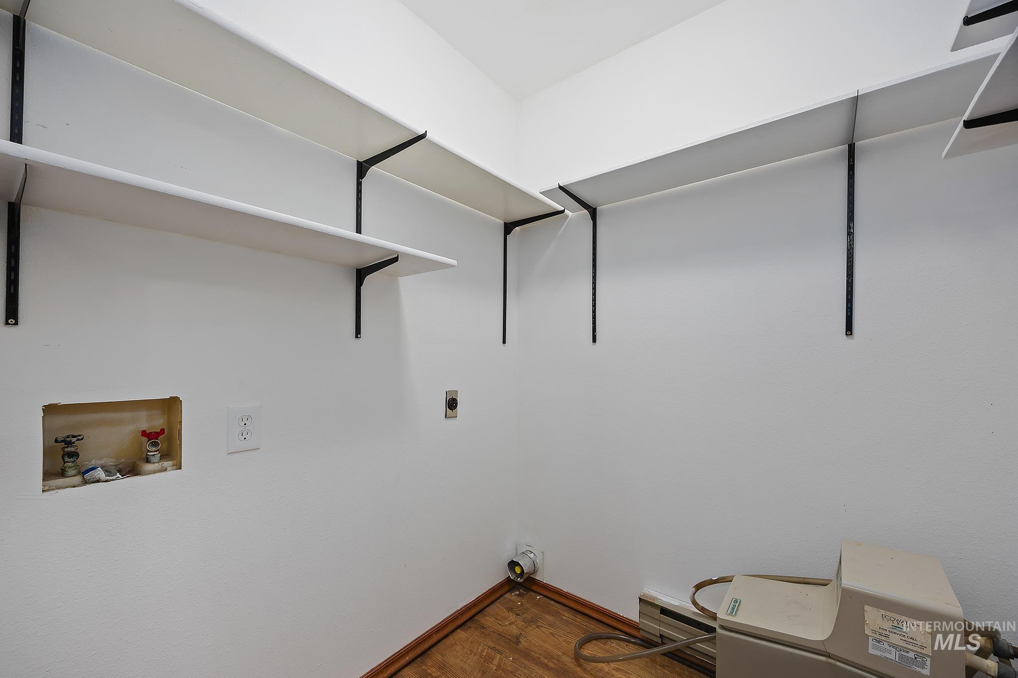 Laundry room featuring washer hookup, dark wood-style flooring, and electric dryer hookup