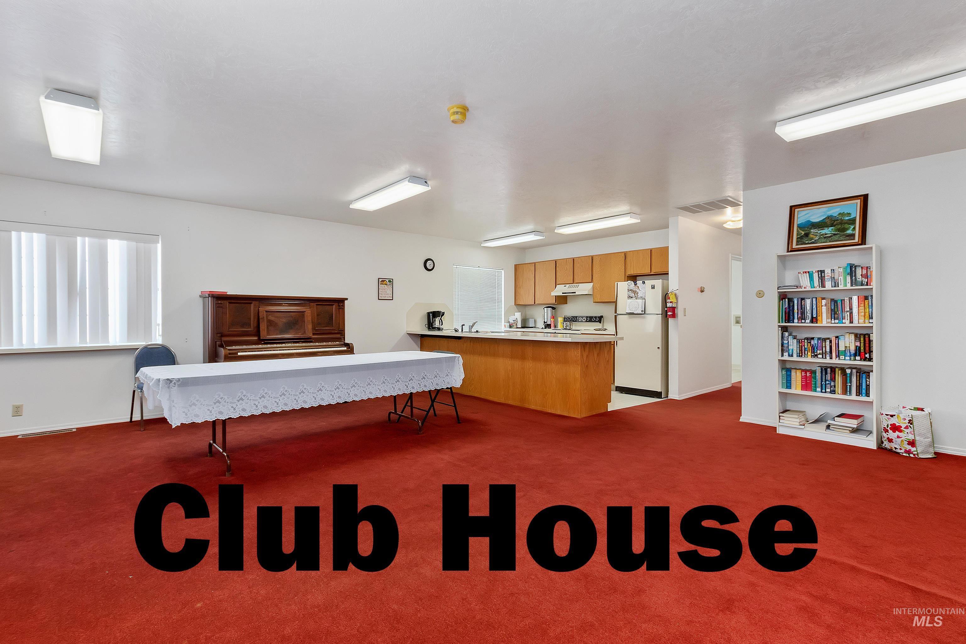 Living area with dark carpet