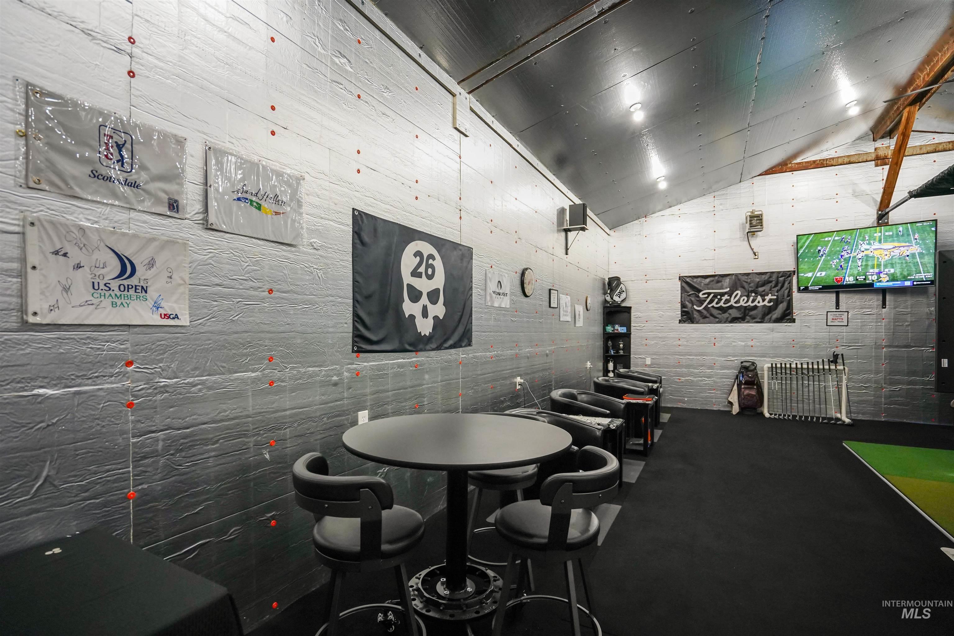 Game room featuring lofted ceiling