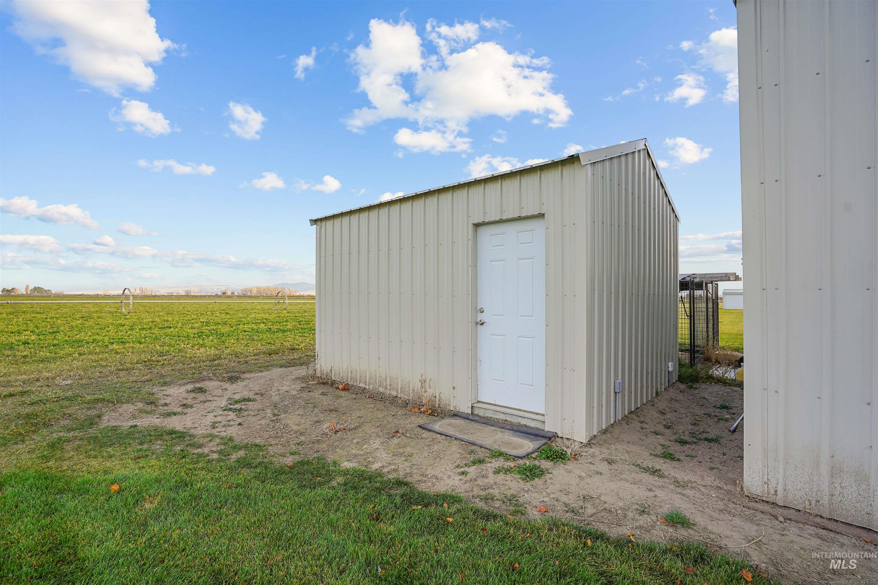 View of shed with a view of rural / pastoral area