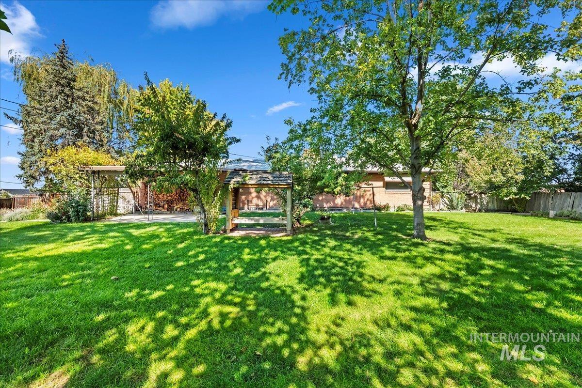 Fenced backyard featuring a patio area