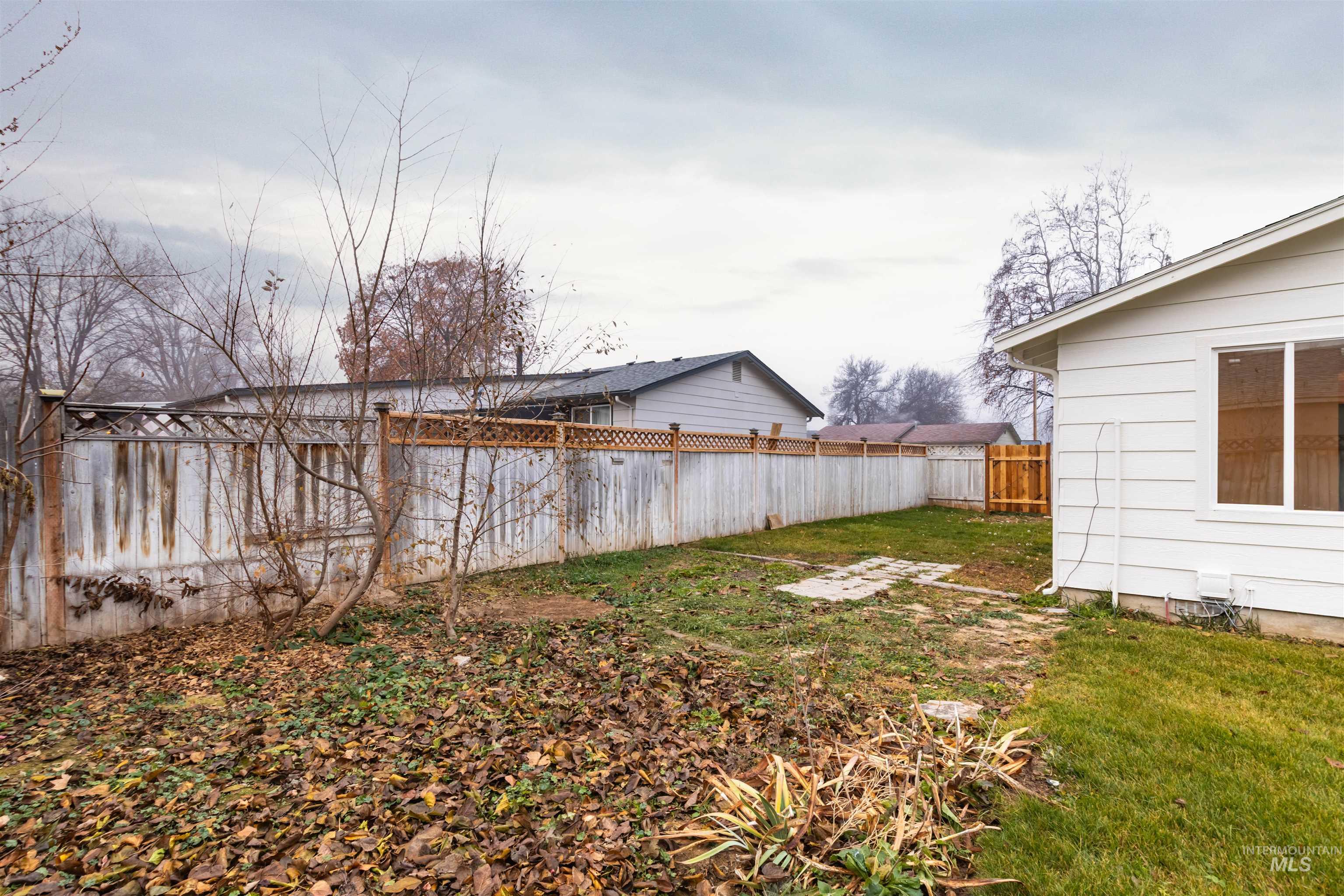 View of fenced backyard
