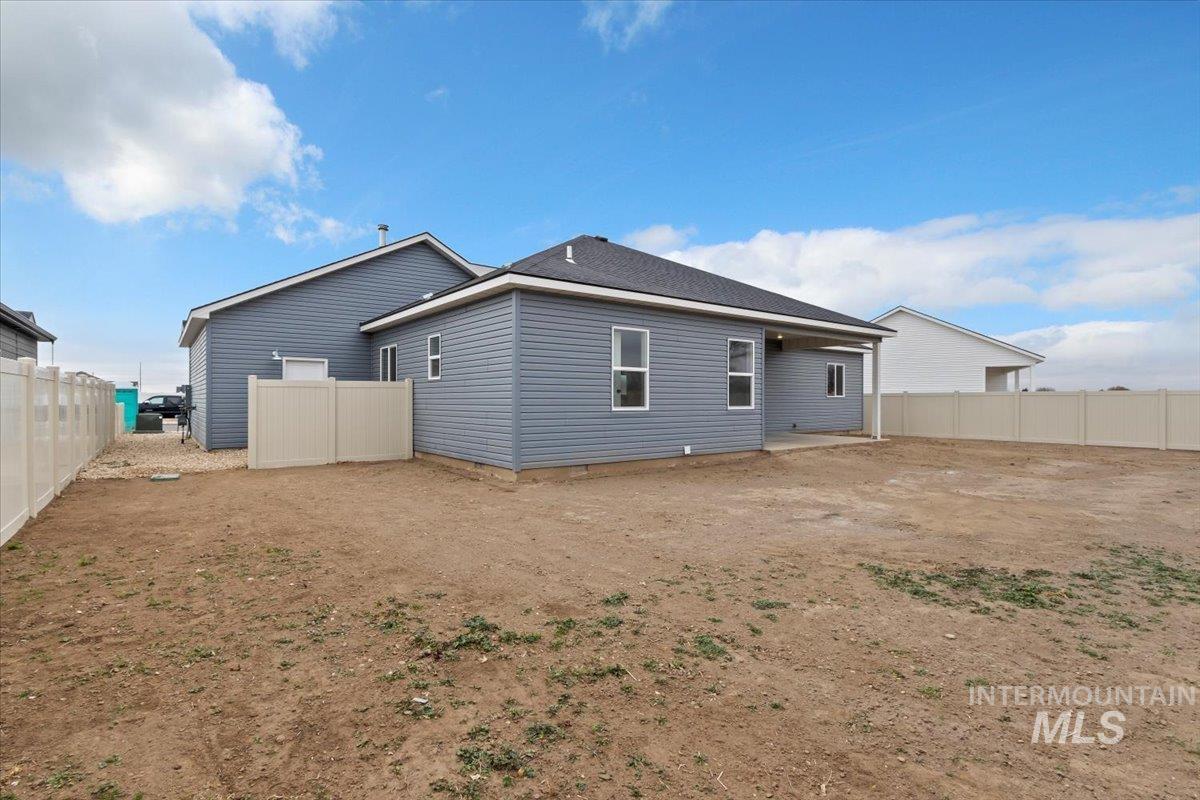 Back of property featuring a patio area