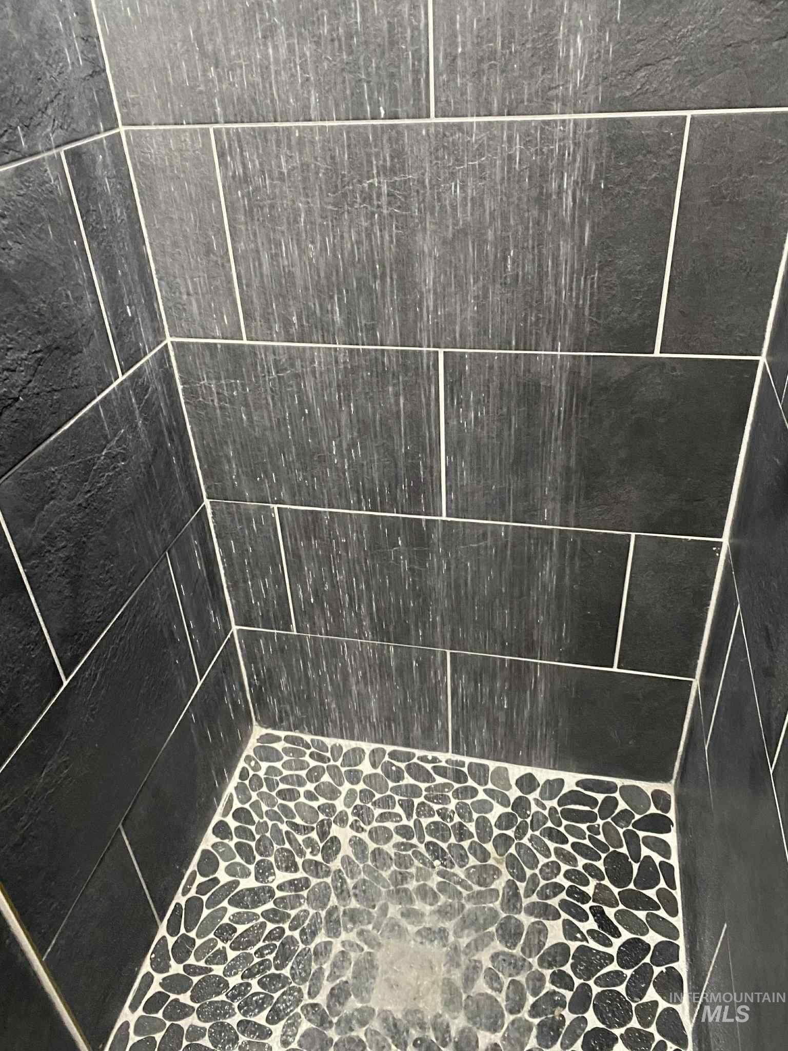 Bathroom view of tiled shower